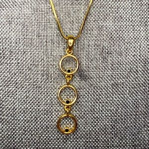 Lia Sophia Gold 3 circle necklace with tiny black gemstones